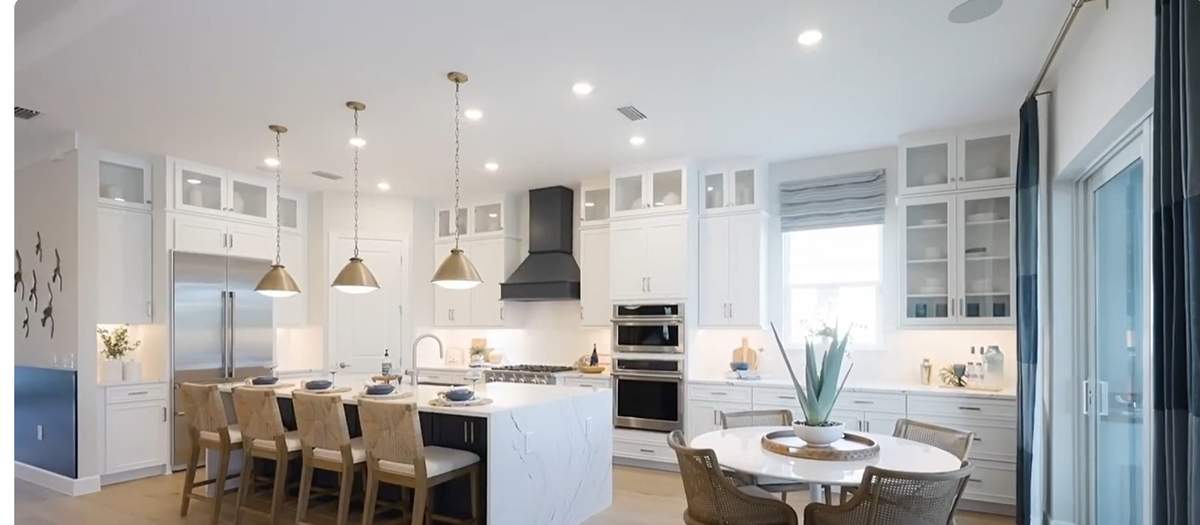 Model home kitchen at Esplanade at Kingston, real photo
