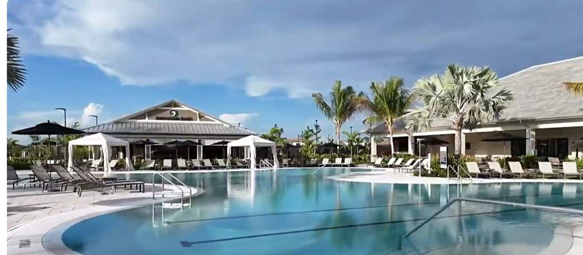 Resort pool and clubhouse at Esplanade at Kingston, real photo