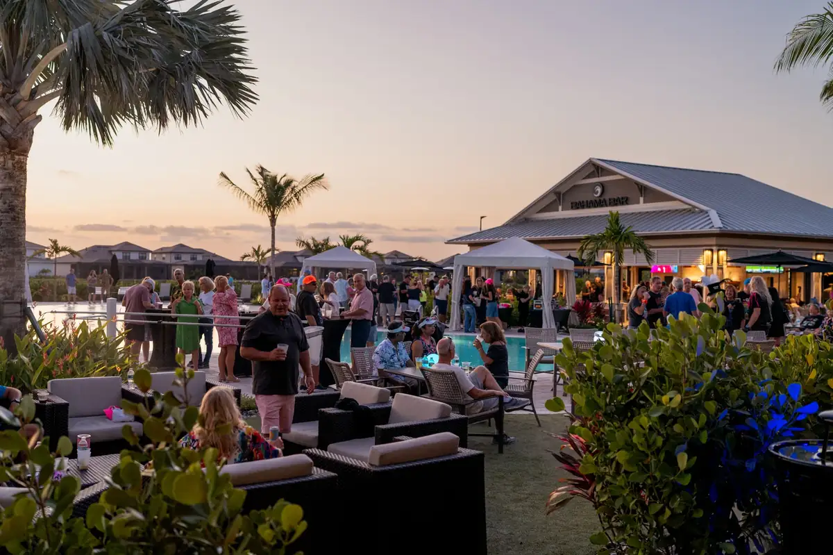 Residents gathered at sunset for a social event at Kingston
